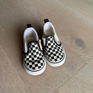 Vans Black and White Checkerboard Slip-On Sneakers